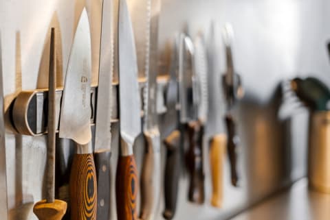A magnetic knife strip keeps essential cooking tools organized and within reach, making meal prep effortless during your stay.