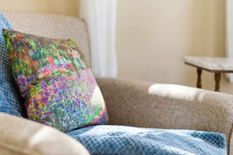 Settle into plush comfort with vibrant pillows and soft throws that invite you to unwind and feel completely at home in your cozy retreat.