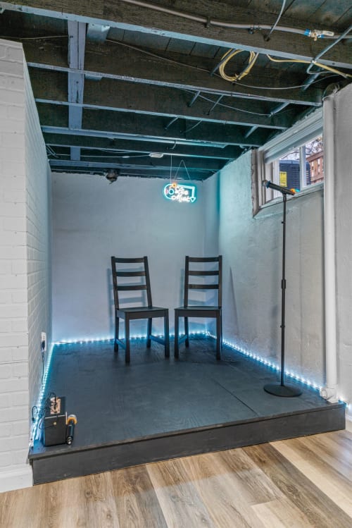 Discover your own creative studio space with modern lighting and seating for inspiration.