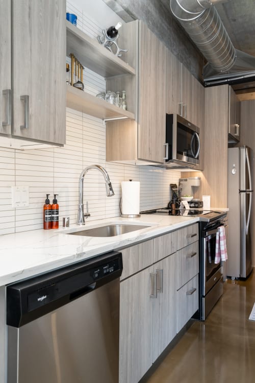 Your modern kitchen features sleek appliances and marble counters, perfect for preparing meals during your stay.