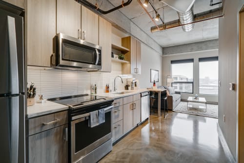 Your modern kitchen features sleek appliances, ample counter space, and stylish finishes, creating the perfect space for preparing meals during your stay.